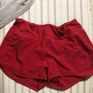 Red Lululemon shorts